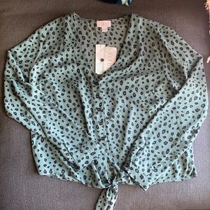 Brand new, never worn, long sleeve blouse